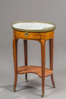 an image of a small table with a marble top on a stand