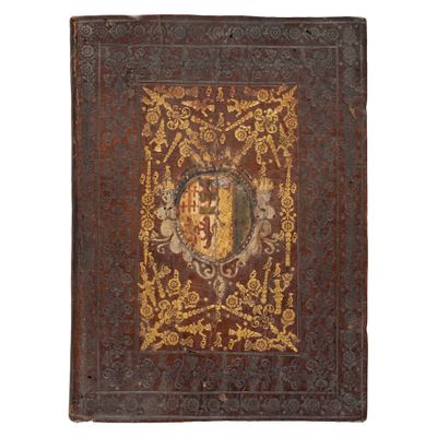 an old book with a coat of arms on it