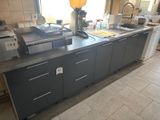 a kitchen with a lot of counter space and a lot of counter space