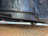 a close up view of a car ' s exhaust pipe