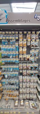 a large display of food in a store for sale