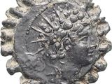 a close up of a coin with a face on it