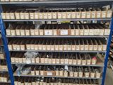 many boxes of assorted items on the shelves