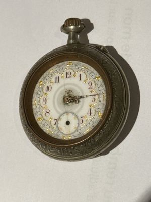a clock that is hanging on the wall in the room