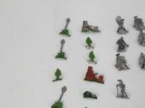 a lot of toy figurines that are on the table