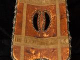 an image of a leather chair with a decorative design