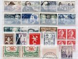 a group of stamps with a picture of a man and a woman on them