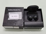 a black box with a pair of earphones in it
