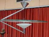 an image of a ceiling light with a red curtain in the background