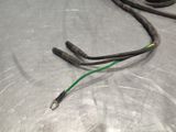 two wires that are connected to a wire on a table