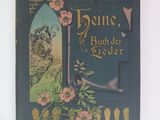 a blue book with a picture of a cat and a bird on it