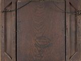 an old wooden picture frame with a picture of a man on it