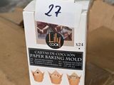 a box of cake sitting on top of a cardboard box