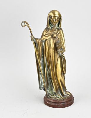 bronze statue of a woman holding a staff and wearing a robe