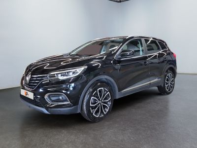 a black renault kad suv parked in a showroom