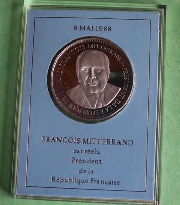 a picture of a coin with a picture of a man on it