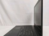 the back of a laptop computer sitting on top of a white table