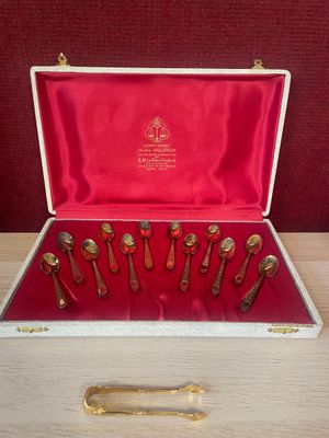 a box with a set of silverware in it on a table