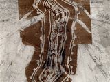 a piece of paper with a drawing of a woman on it