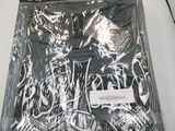 a plastic bag with a picture on it sitting on a table