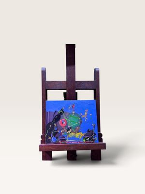 une image représentant un petit chevalet sur lequel est posé un tableau représentant un poisson