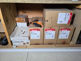 many boxes that are sitting on a shelf