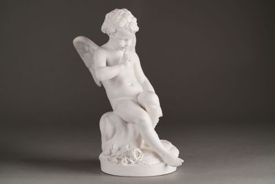 statue of an angel with a harp on a gray background