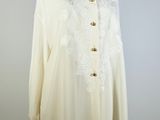 an image of a white shirt on a mannequin mannequin stand