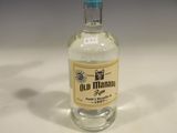 a bottle of old havana tequila sitting on a table