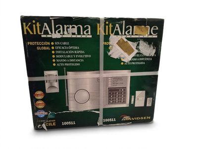 the box is open to show the contents of a home alarm