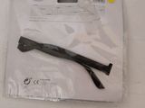 a pair of scissors sitting on top of a plastic bag