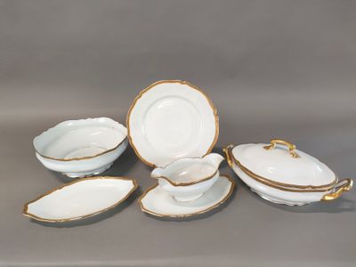 an image of a group of white and gold china dishes