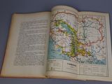 an open book with a map of canada on it