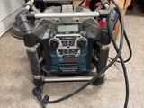 the corded drill is connected to the corded machine in the room