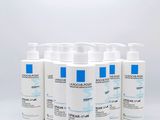 six flacons de lotion, de lotion, de lotion, de lotion, de lotion, de lotion, de lotion, de lotion, de lotion, de lotion