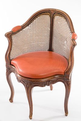 an image of a chair with a leather seat on a white background