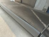 a close up of a car door with a handle on it
