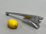 a lemon and a juicer on a table