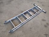 a close up of a ladder laying on the ground