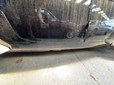 a reflection of a car in the side mirror of a car