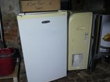 a refrigerator and a freezer in a room