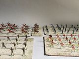 a lot of small figurines that are on a table