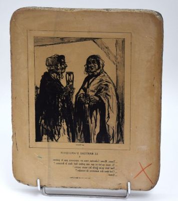 un vieux livre sur lequel figure le dessin d'un homme et d'une femme debout l'un à côté de l'autre