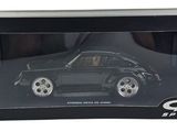 a black box with a toy car inside of it