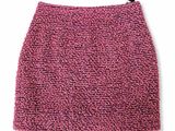 a pink knitted skirt with a zipper at the bottom