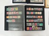 many different types of stamps on the pages of a book