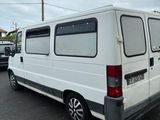 a white van that is parked in a parking lot