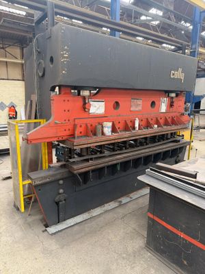 an image of a large machine in a factory with lots of steel