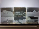 a picture of a picture of a man walking on the beach