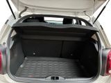 a trunk of a car with the back door open